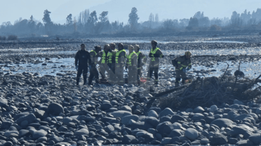 Investigan hallazgo de cadáver de extranjero en el río Teno