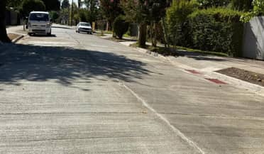 Finalizan trabajos en calle René León: Municipio repara asfalto previo al inicio del año escolar