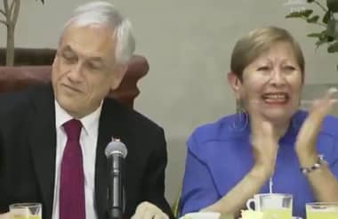 Mujer eufórica en desayuno de Piñera es militante RN y excandidata a concejal